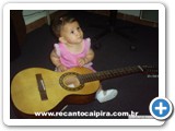 Maria Eduarda (Neta de Ramiro Vila) aos 8 meses de idade quando ganhou sua primeira violinha do av